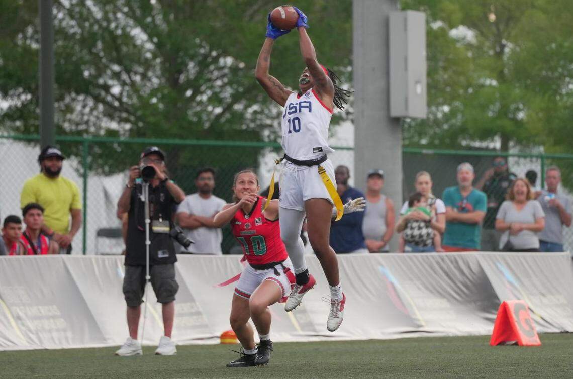 Greenville, NC, native Amber Clark (10) hauls in an interception during the gold medal game of the International Federation of American Football’s Americas Continental Championship against Mexico. The U.S. won the game, 26-21.