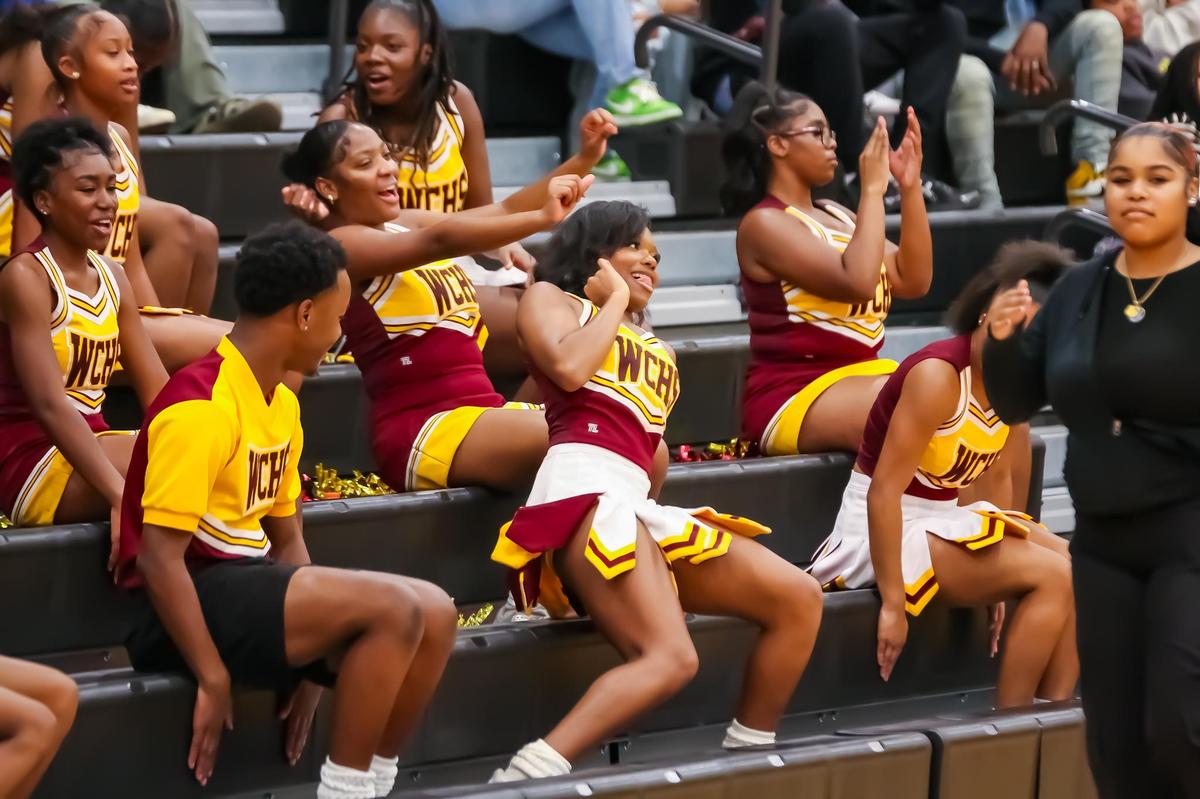 West Charlotte cheerleaders hype up the crowd with a cheer during a timeout in the first quarter at West Charlotte high school in Charlotte, N.C. on December 17th, 2024.