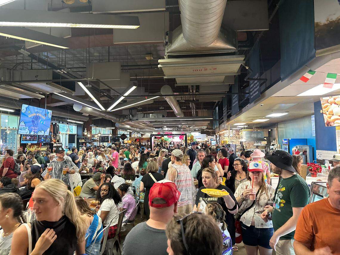 Lovin’ Life Music Fest concertgoers packed The Market at 7th Street in uptown Charlotte after the festival grounds were evacuated amid lightning.