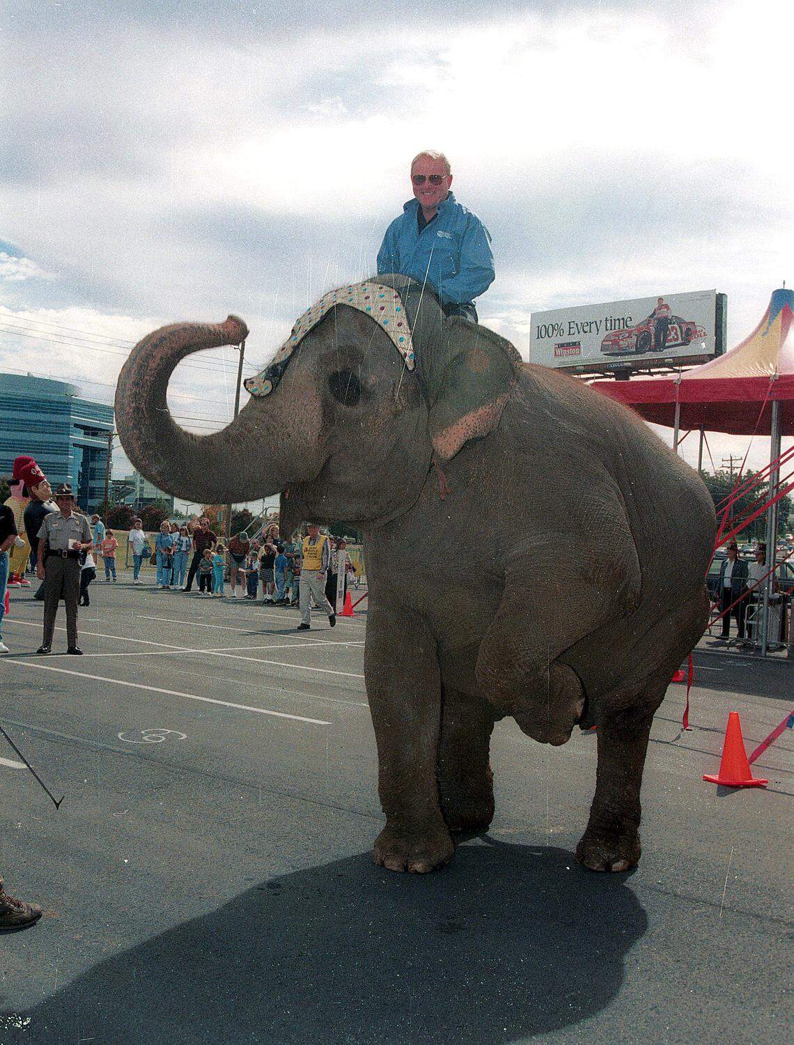 As part of one of his promotions, Humpy Wheeler rides an elephant at Charlotte Motor Speedway. Wheeler at one point brought a three-ring circus to the track’s infield.