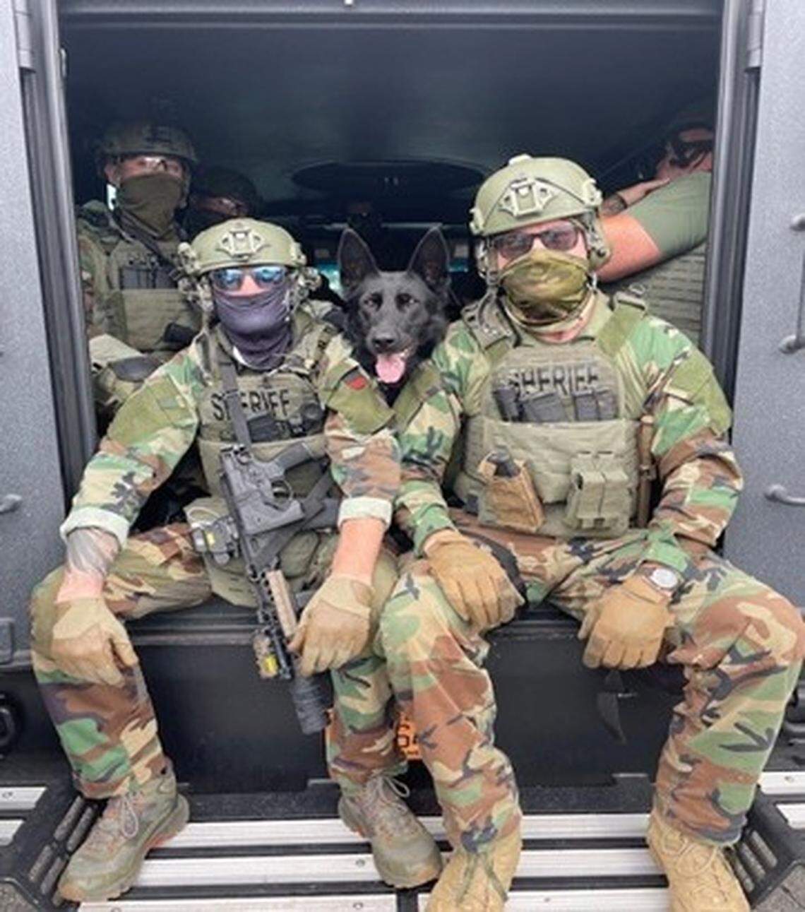 Members of the Iredell County Sheriff’s Emergency Response Team concealed their identities with a piece cloth known as a gaiter while conducting two drug busts on Aug. 8 in Statesville.