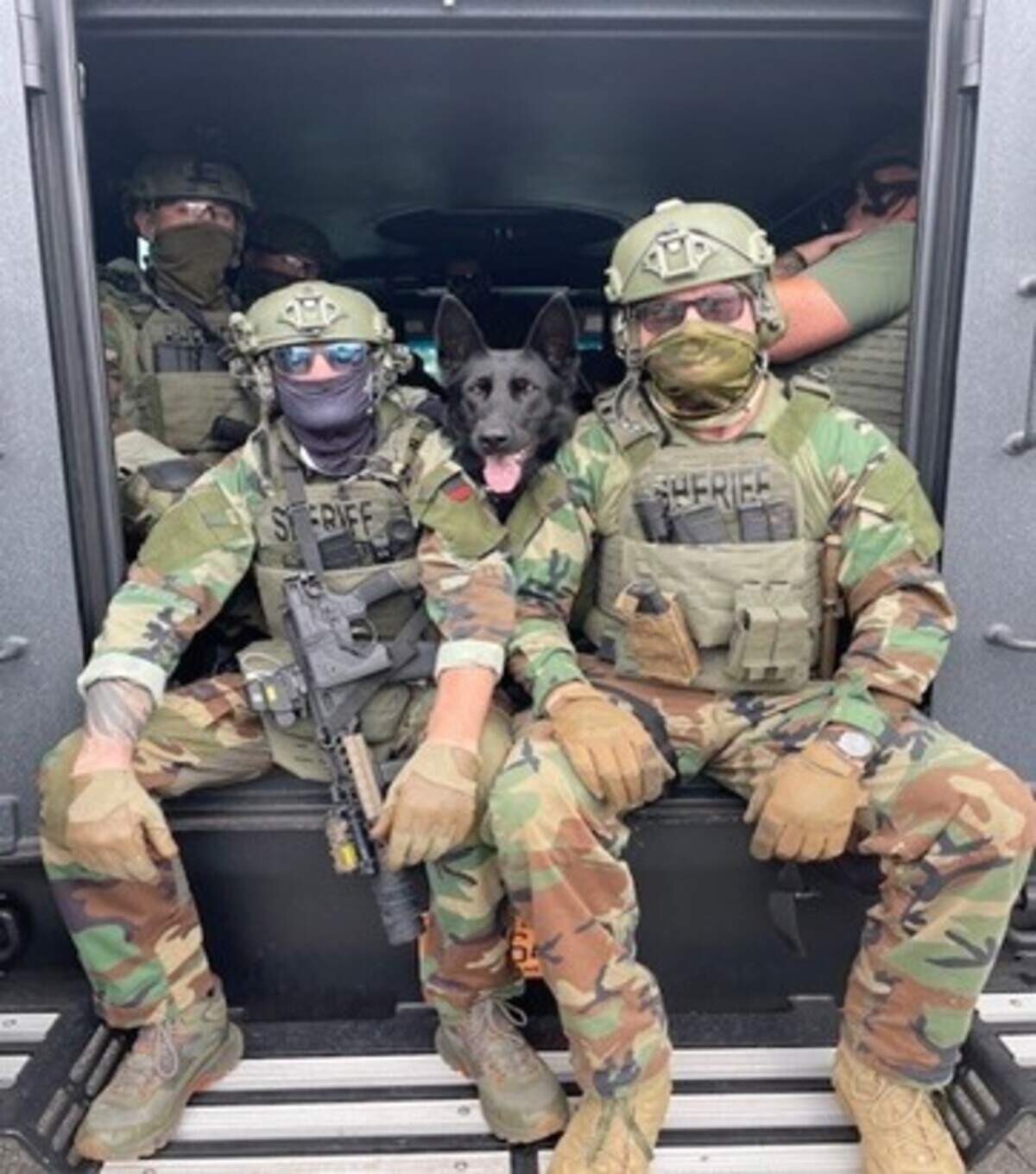 Members of the Iredell County Sheriff’s Emergency Response Team concealed their identities with a piece cloth known as a gaiter while conducting two drug busts on Aug. 8 in Statesville.