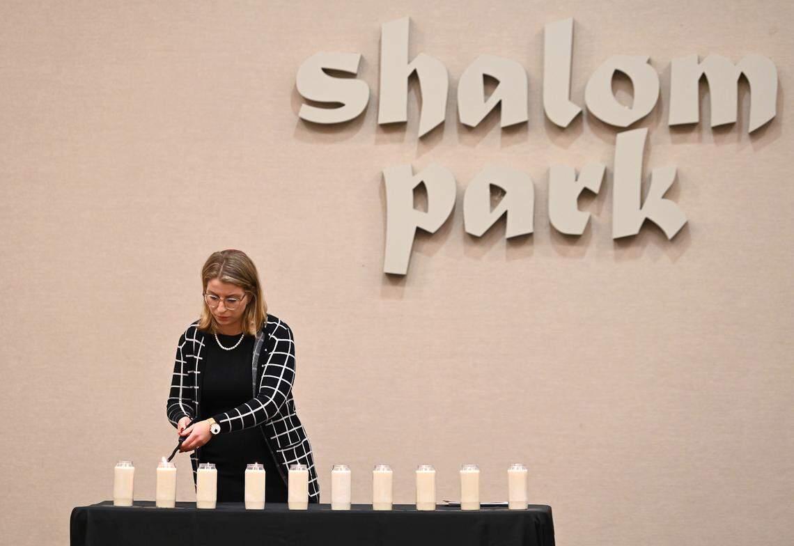 Rabbi Lexi Erdheim lights candles for those that were killed in Israel over the weekend. A Community Gathering for Israel was held on Monday, October 9, 2023 at Shalom Park in Charlotte, NC