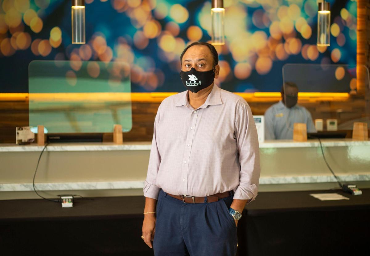 Vinay Patel, a principal of Sree Hotels stands for a portrait at the Spring Hill Suites in Uptown Charlotte, NC on Wednesday, August 19, 2020. Patel said there is an estimated $3 million in lost profit since the RNC has mostly left Charlotte this year among the 12 local hotels Sree Hotels operates.