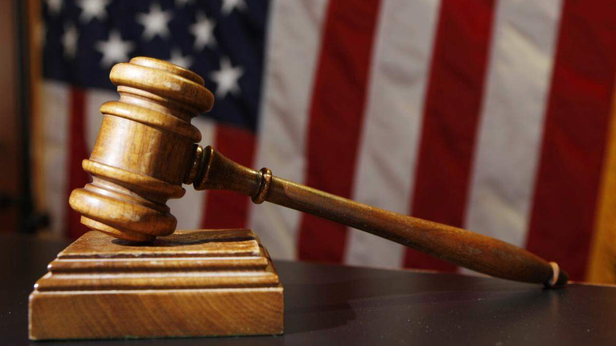 A Kansas City woman was sentenced to 84 months in prison Thursday after she admitted to robbing two banks last year, prosecutors said.