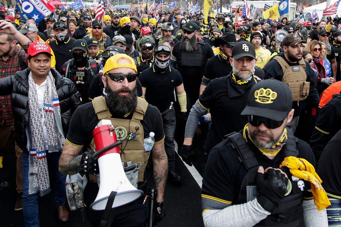 Far-right Proud Boys member Jeremy Joseph Bertino, second from left, joins other supporters of President Donald Trump who are wearing attire associated with the Proud Boys as they attend a rally at Freedom Plaza, Dec. 12, 2020, in Washington. Bertino pleaded guilty on Thursday, Oct. 6, 2022, to plotting with other members of the Proud Boys to violently stop the transfer of presidential power after the 2020 election, making him the first member of the extremist group to plead guilty to a seditious conspiracy charge.