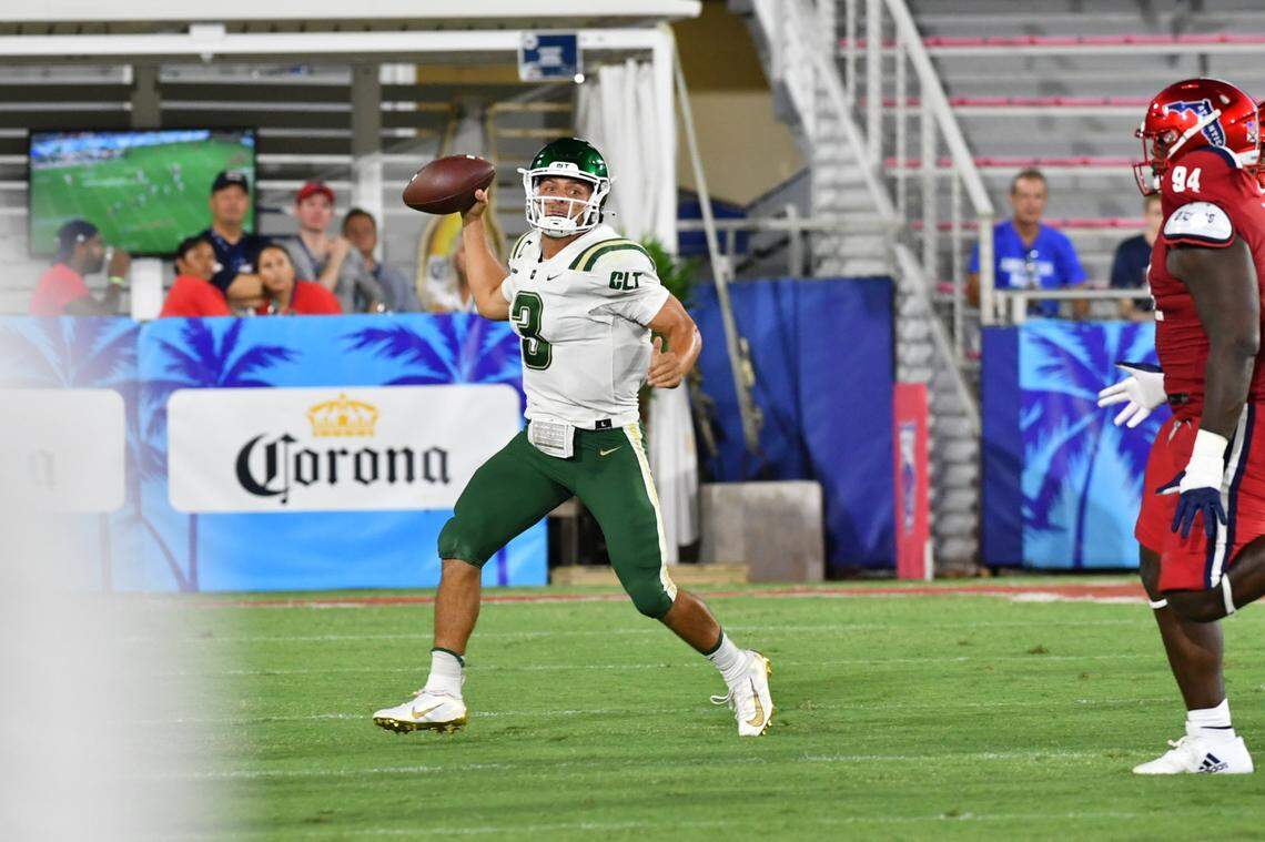 Charlotte 49ers quarterback Chris Reynolds drops back to pass against Florida Atlantic during the teams’ game in Coral Gables, Florida on Saturday, August 27, 2022. Reynolds tossed two touchdowns in the game to Grant DuBose, but the 49ers fell, 43-13.