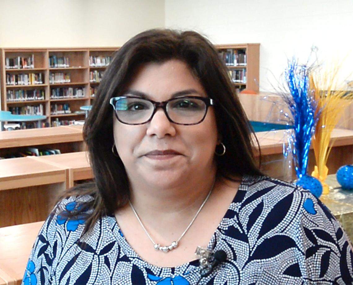Carmen Concepción, principal of the new Charlotte East Language Academy, is one of only three Hispanic principals in CMS.