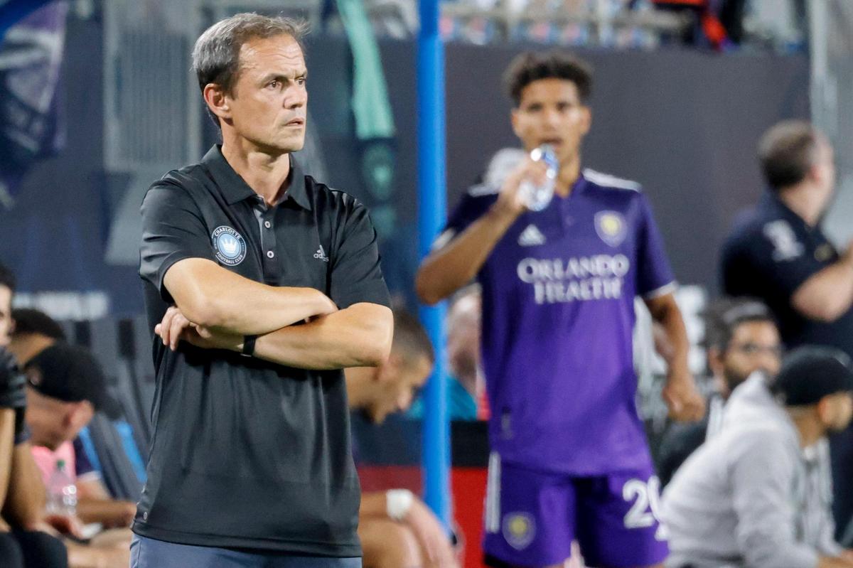 Charlotte FC head coach Christian Lattanzio watches his team in the second half against Orlando City in Charlotte, N.C., Sunday, Aug. 21, 2022.