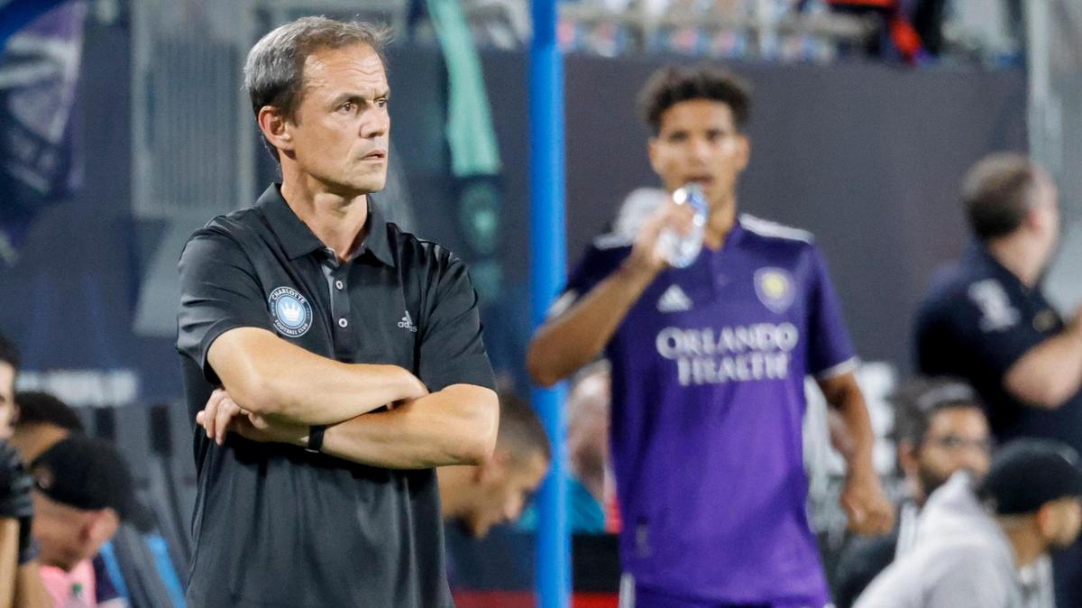Charlotte FC head coach Christian Lattanzio watches his team in the second half against Orlando City in Charlotte, N.C., Sunday, Aug. 21, 2022.