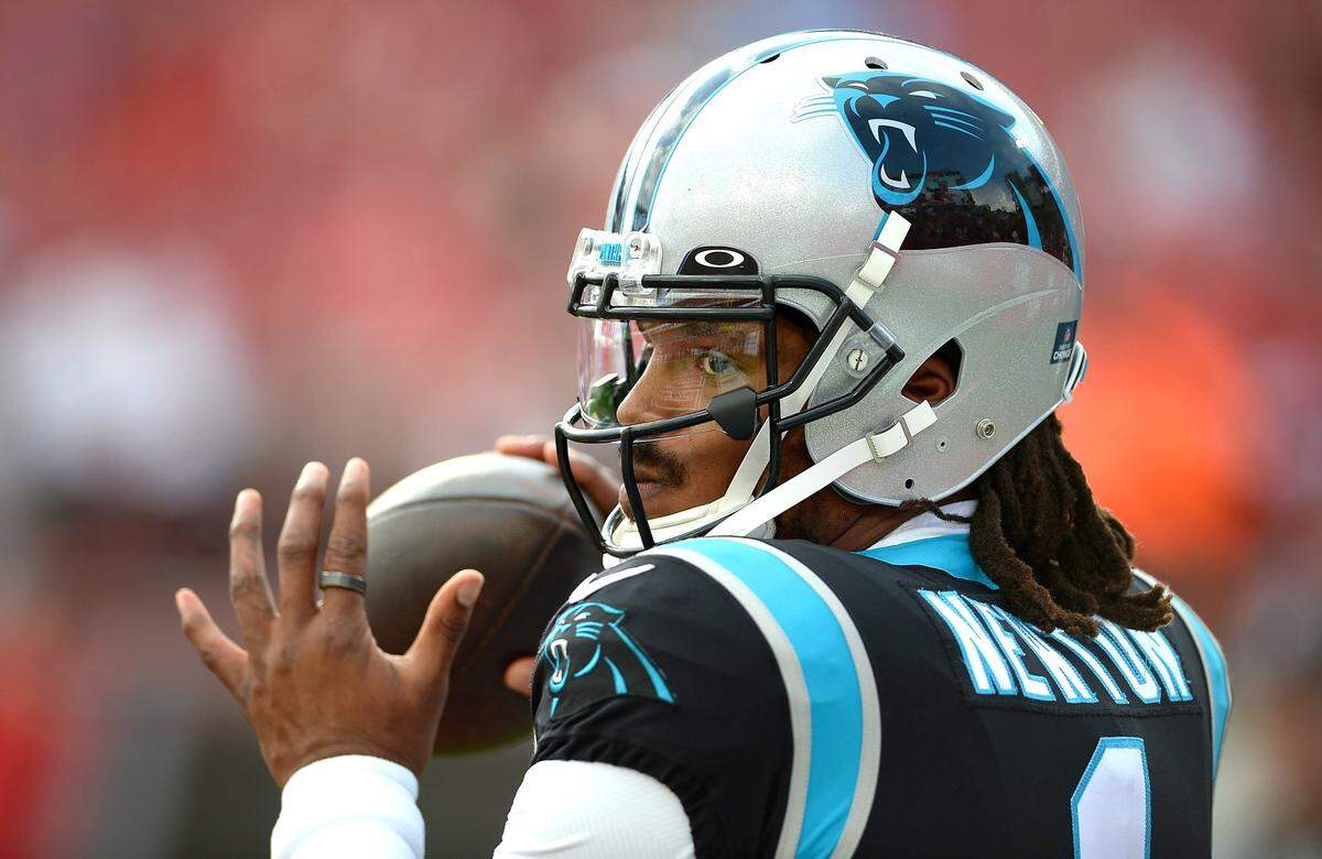 Carolina Panthers quarterback Cam Newton warms up at Raymond James Stadium in Tampa, Fl. prior to action against the Tampa Bay Buccaneers on Sunday, January 9, 2022.