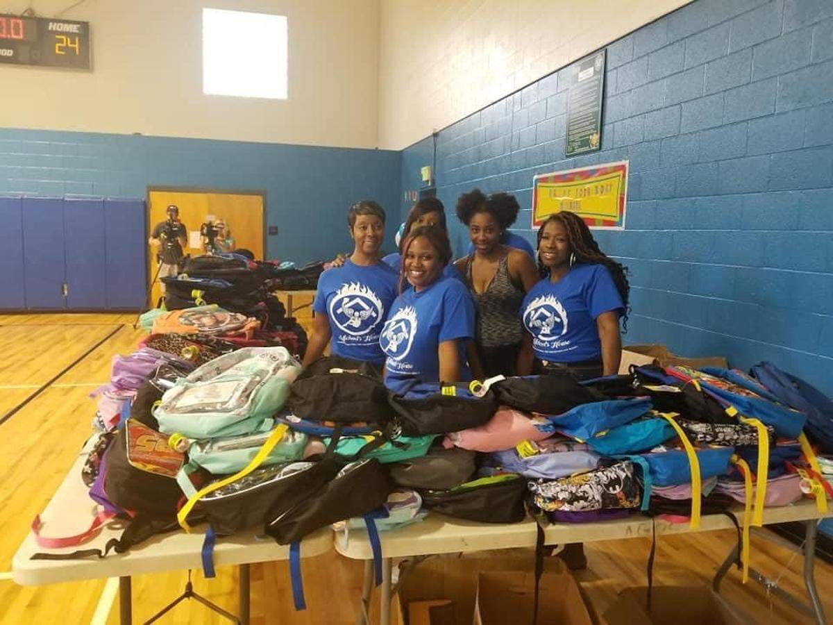 Dominique Bradley began an annual book bag drive three years ago months after her 9-year-old son Michael Johnson died in a west Charlotte apartment fire.