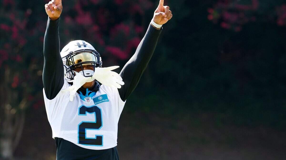 Carolina Panthers wide receiver DJ Moore (2) motions to fans during the teams training camp practice at Wofford College in Spartanburg, S.C., Thursday, July 28, 2022.