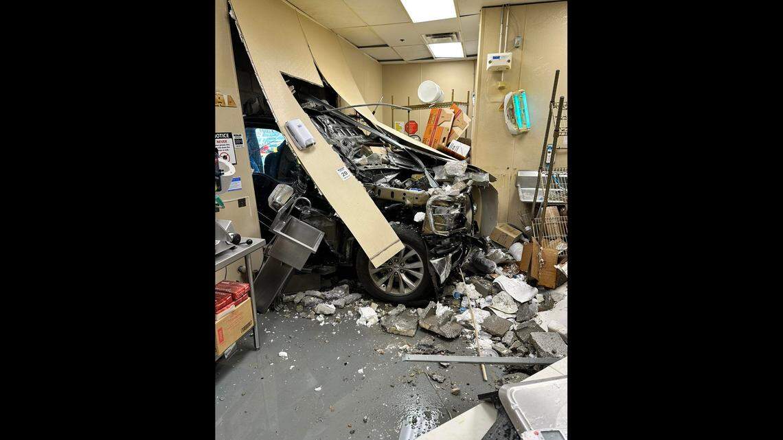 A driver had to be rescued from inside a Walmart after pickup crashed through an exterior wall and got stuck, N.C. fire department says.