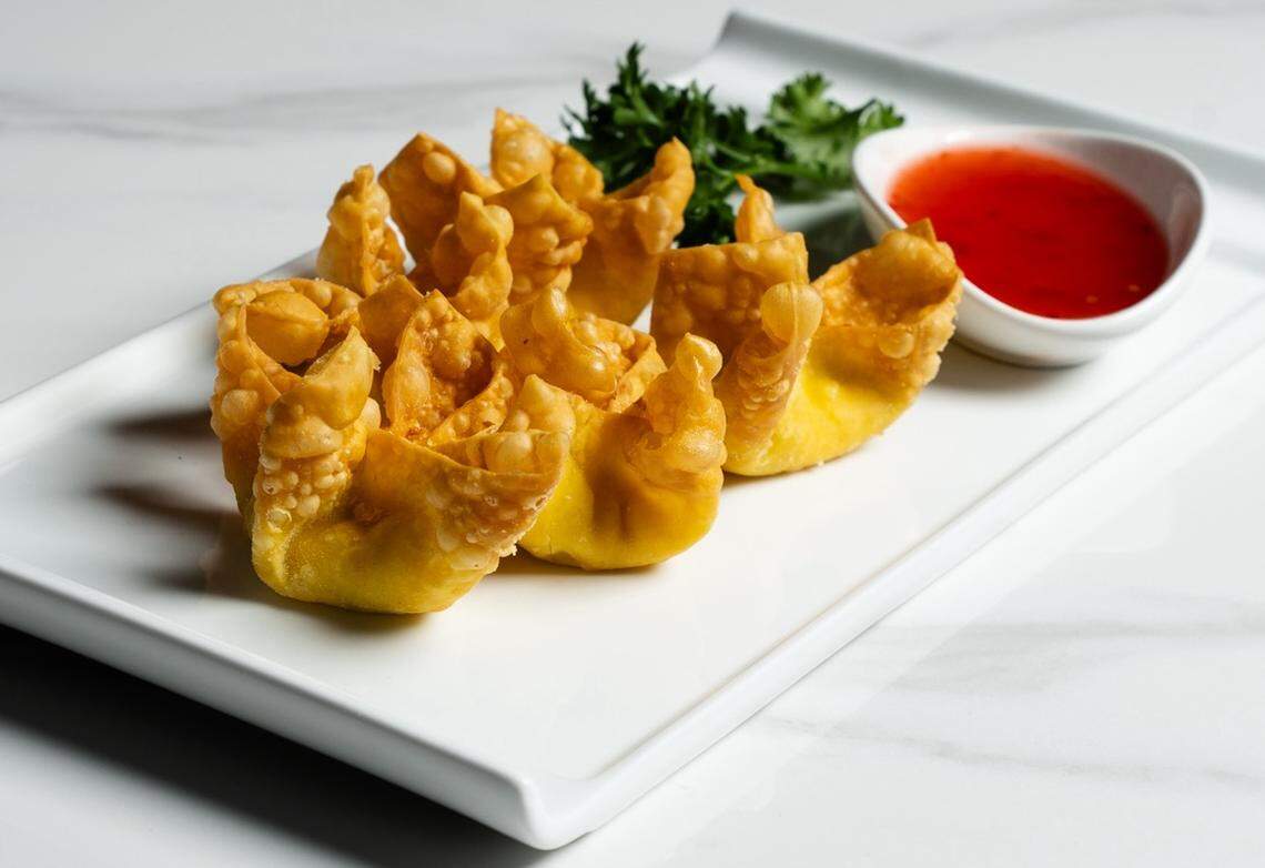 Flame Bistro & Bar’s Golden Crab & Brie Wonton Crisps.