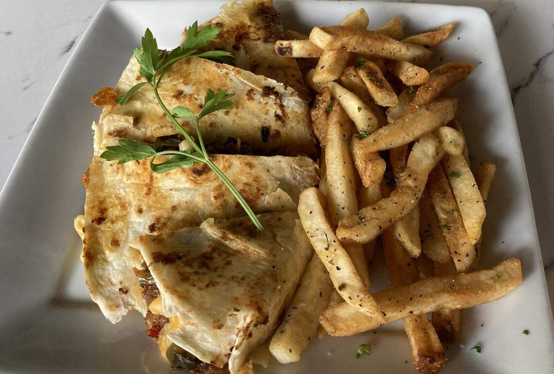 Smith’s Soul Food Quesadilla with fries.
