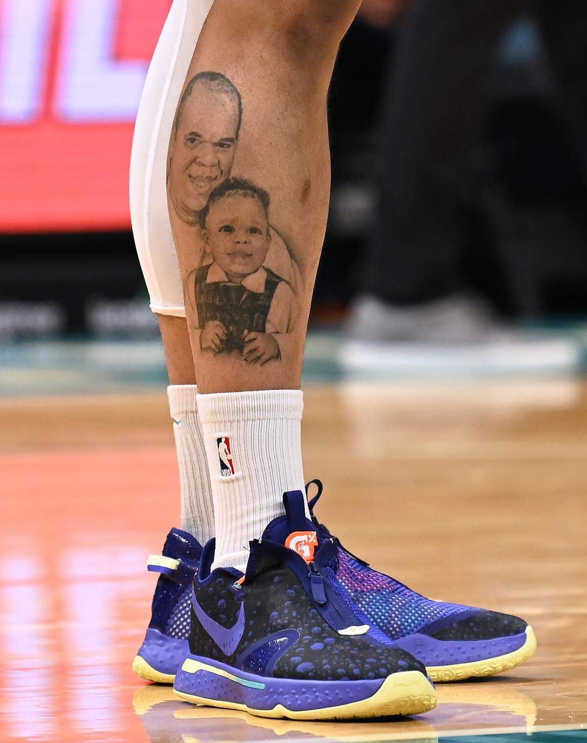 Charlotte Hornets forward Miles Bridges has his favorite photograph of he and his father tattooed onto his right leg.