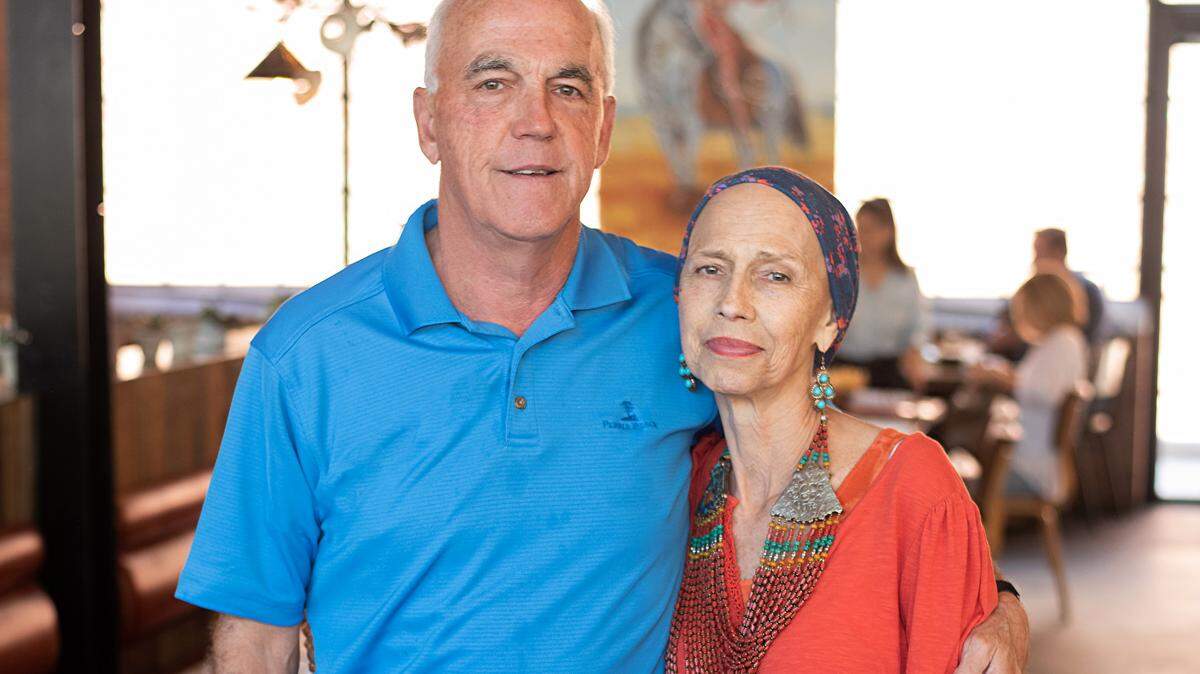 Former Charlotte Panther Jonathan Stewart snapped this photo of Charlotte photographer Deborah Triplett and her brother Ricky Triplett and secretly paid for their meals at Superica restaurant on Tuesday. Stewart made the goodwill gesture on the same day he retired from professional football.