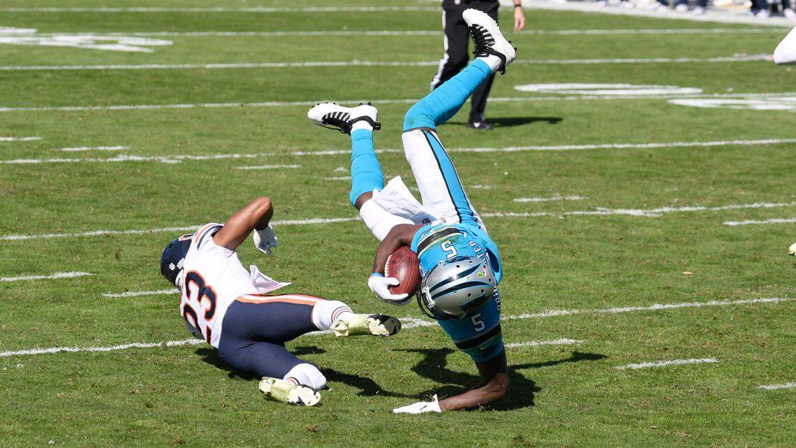Carolina Panthers quarterback Teddy Bridgewater (5) is upended by Chicago Bears defender Kyle Fuller in first half action at Bank of America Stadium on Sunday, October 18, 2020.