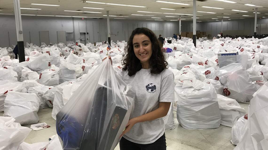 For these foreign exchange students, volunteering at Christmas center is eye-opening