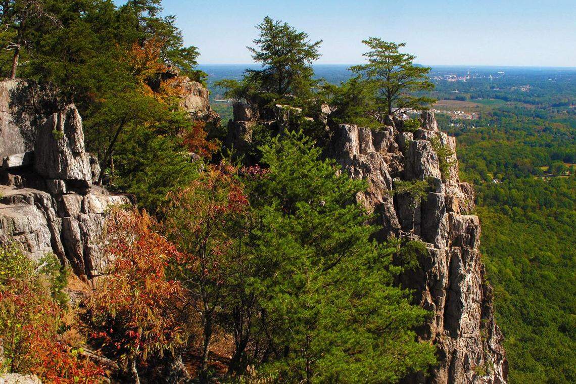Crowders Mountain State Park is about a 32-mile drive west from uptown Charlotte. The park is known to have challenging trails and is popular for rock climbing, according to North Carolina State Parks.