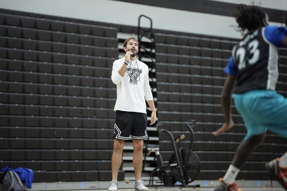 Head basketball coach Beau Maye looks on during a boys varsity basketball practice at Hough High School, Monday, Nov. 10, 2025, in Cornelius, N.C.
