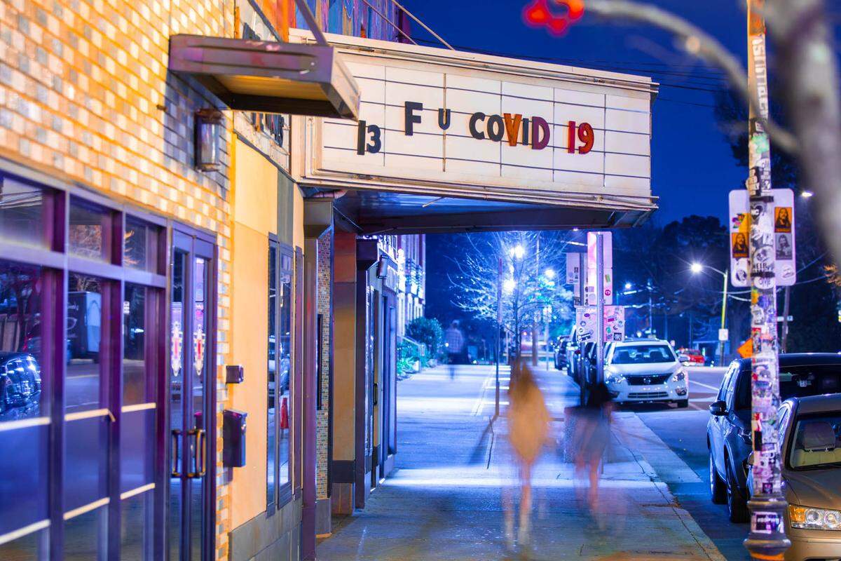 Neighborhood Theatre in NoDa displays a sign exhibiting disdain for COVID-19 on March 13, 2020.