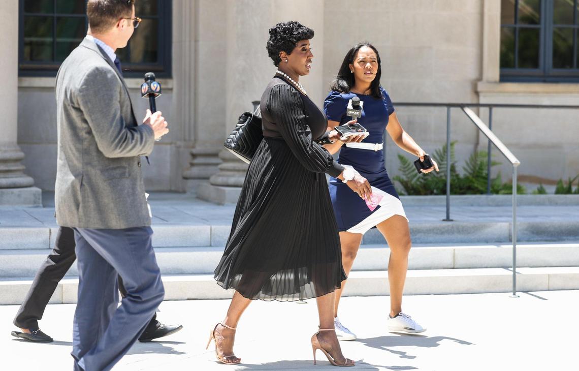 City Councilwoman Tiawana Brown leaves the courthouse in uptown Charlotte after her hearing on Friday.