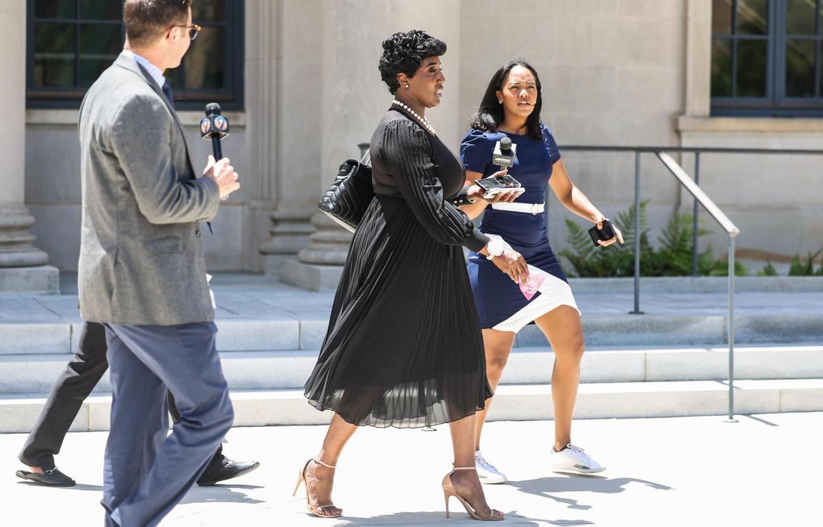 City Councilwoman Tiawana Brown leaves the courthouse in uptown Charlotte after her hearing on Friday.