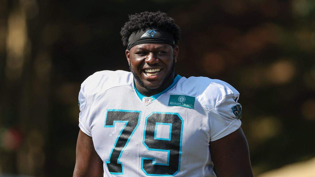 Panthers tackle Ikem Ekwonu walks out to practice at Training Camp on Tuesday, August 2, 2022 in Spartanburg, SC.