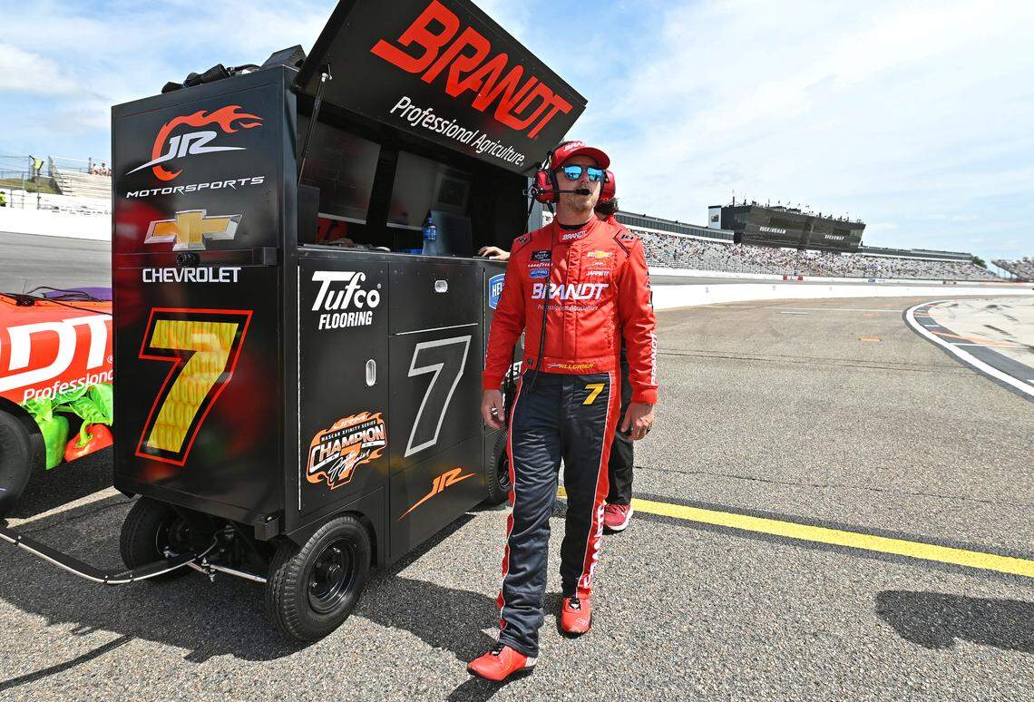 NASCAR Xfinity Series driver Justin Allgaier walks along pit road waiting to qualify for the North Carolina Education Lottery 250 at Rockingham Speedway on Saturday, April 19, 2025.