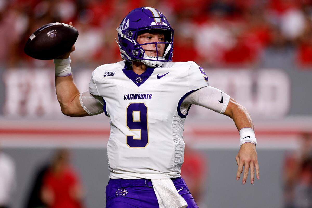 Cole Gonzales of Western Carolina looks to pass during the first half against N.C. State at Carter-Finley Stadium on Aug. 29, 2024, in Raleigh.