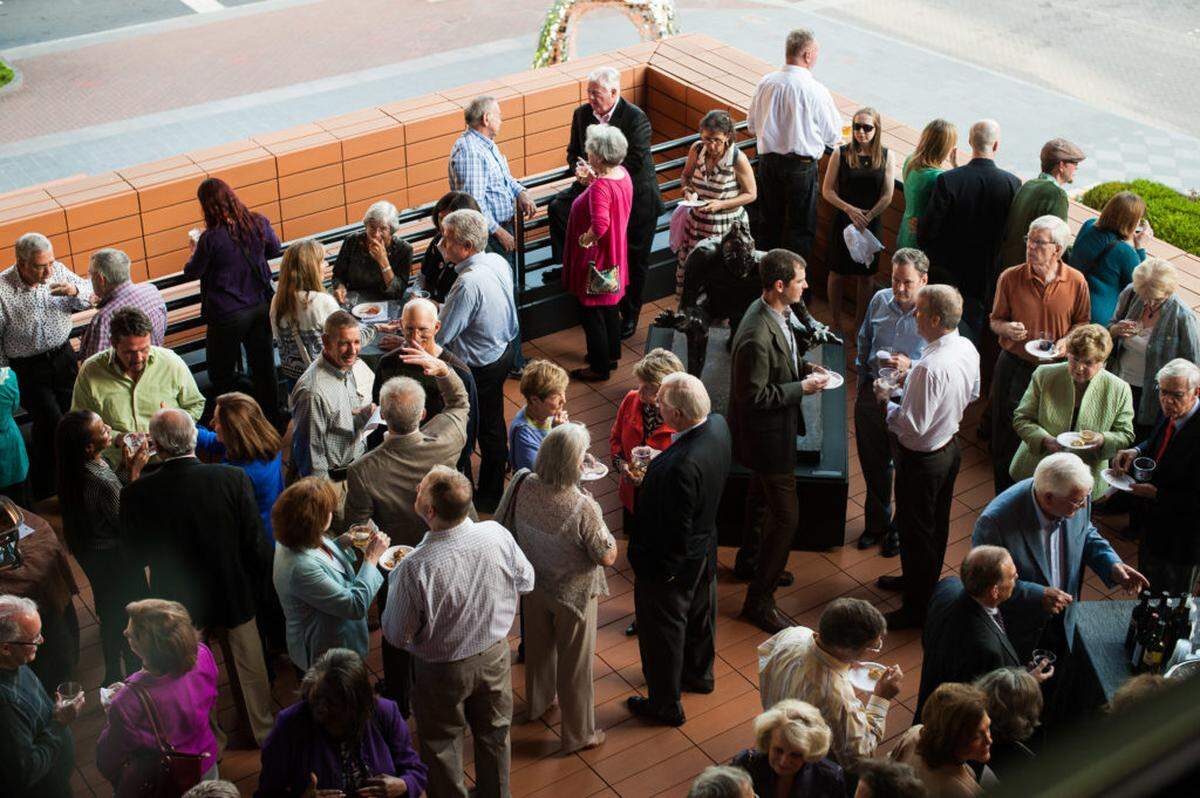 Members of the Bechtler Museum of Modern Art attend an exclusive reception for the exhibition "Appetite for Risk: Works by Emilio Stanzani" in the second-floor gallery on April 25, 2013. Photo by Wendy Yang