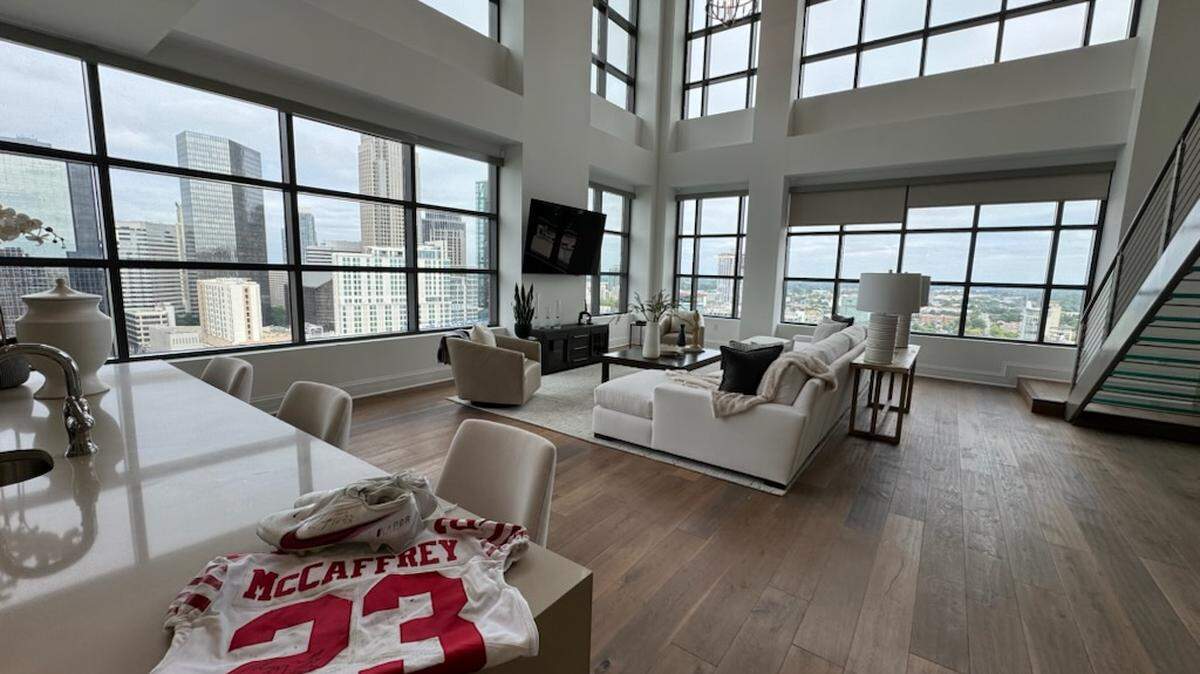 Christian McCaffrey $3 million penthouse in Uptown Charlotte was recently purchased by a family with fans.