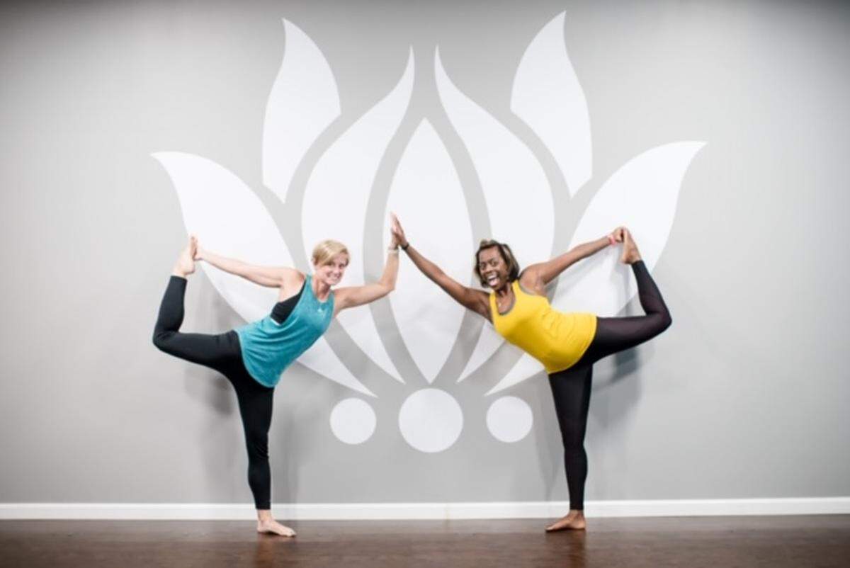 Vicie Moran, right, will open Charlotte Family Yoga Oakhurst in the former NoDa Yoga location. She is shown here with Kara Vincent, co-owner of Charlotte Family Yoga’s Concord location.