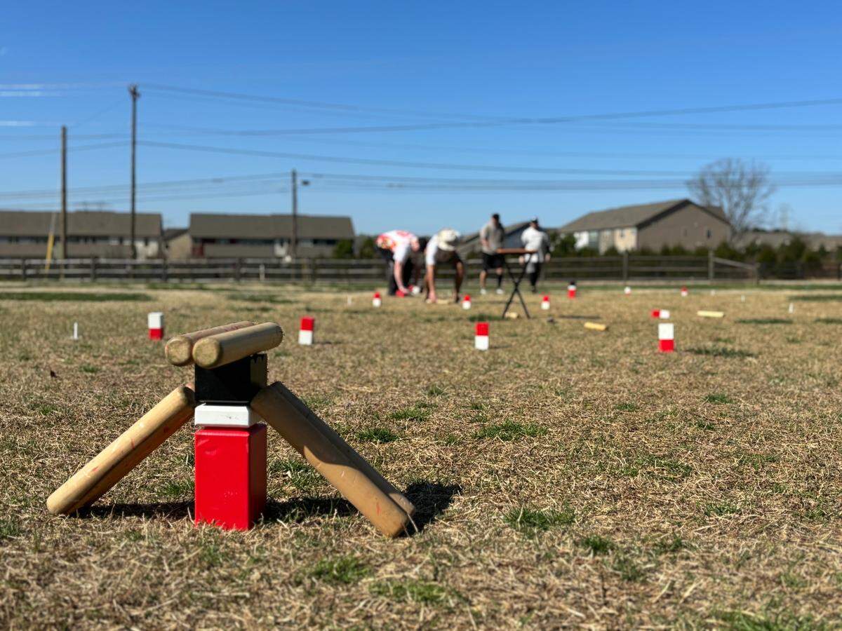 Kubb involves throwing batons to knock down an opponent’s kubbs, which are wooden blocks.