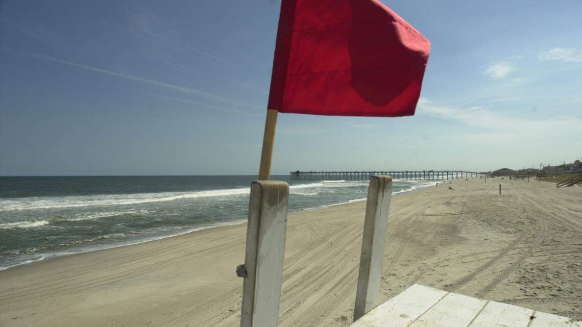 Red flags indicate dangerous currents on off Carolinas beaches.