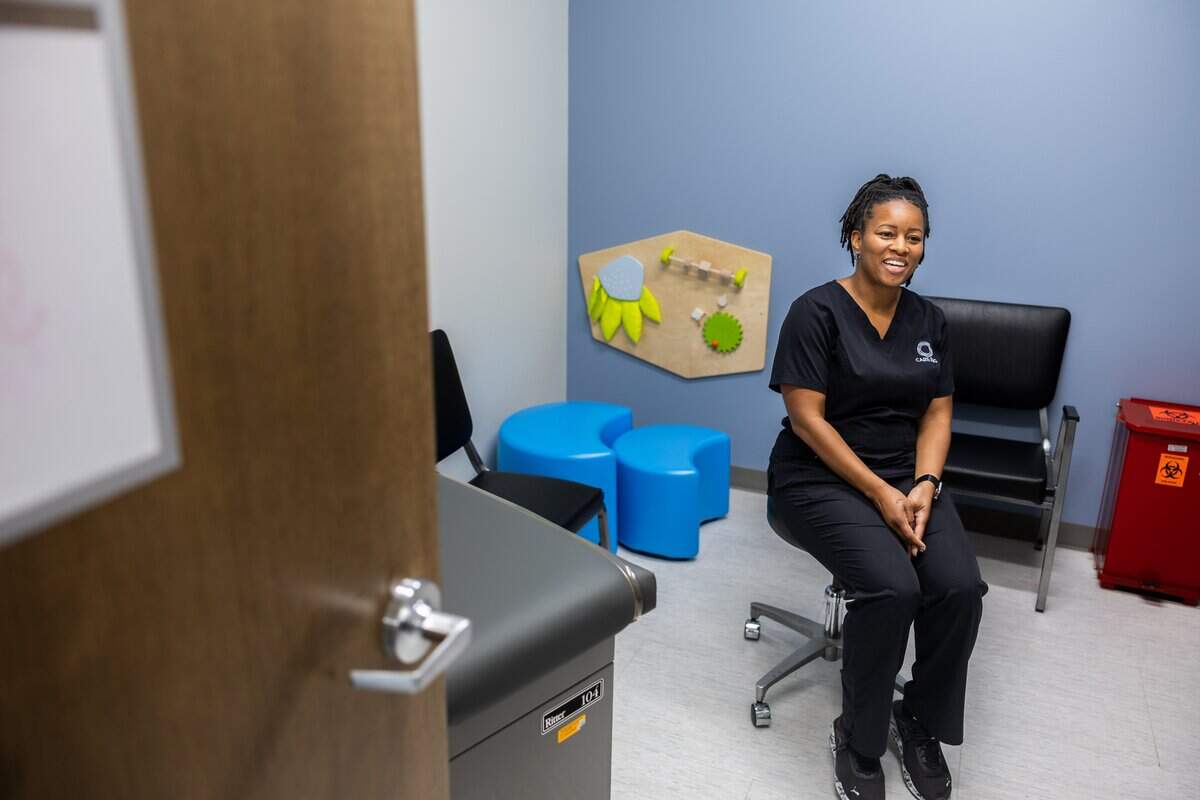 Steffanie Sullivan, NP, talks about the Two-Generation Clinic inside one of the exam rooms and at Care Ring in Charlotte, N.C., on Wednesday, August 13, 2025.