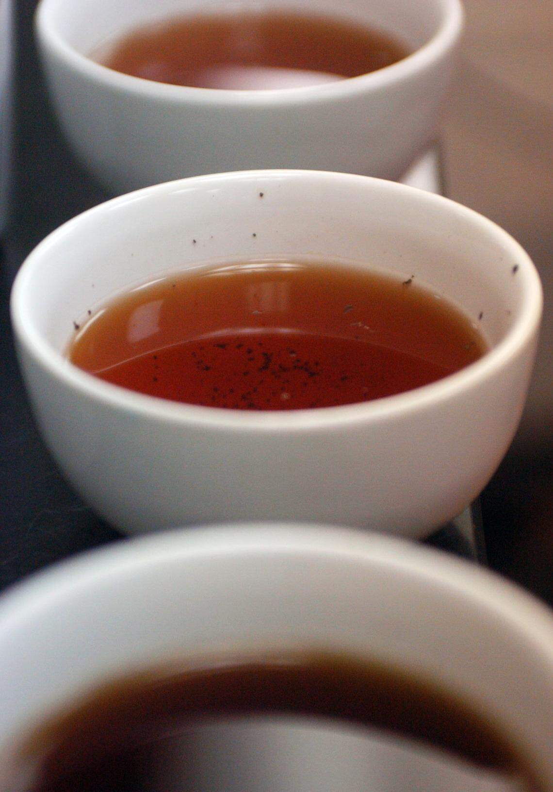 Samples of tea sit in a lab to be taste tested by Joe Doyle, a tea and coffee taster for S&D in Concord, on Feb. 15, 2007. YALONDA M. JAMES
