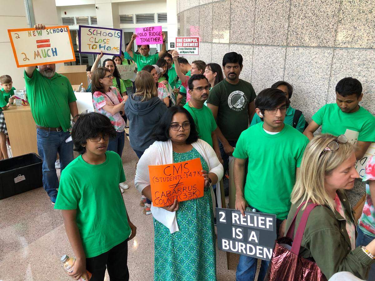 Parents and students gather at Charlotte-Mecklenburg Government Center in Charlotte before the BOE vote on the south Charlotte boundaries plan Tuesday night June 6, 2023