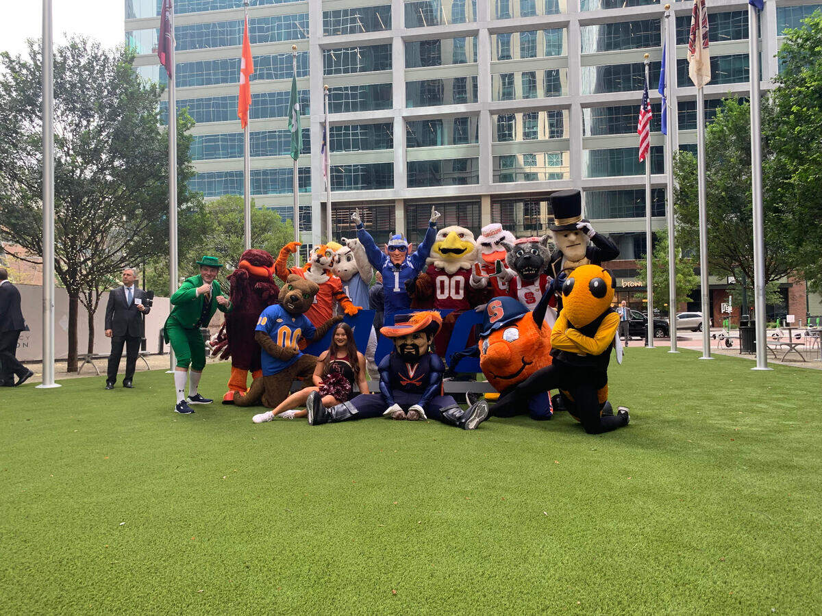 Mascots represting the ACC’s member schools celebrate the opening of the conference’s new Charlotte headquarters, in the Bank of America Tower at the Legacy Union complex.