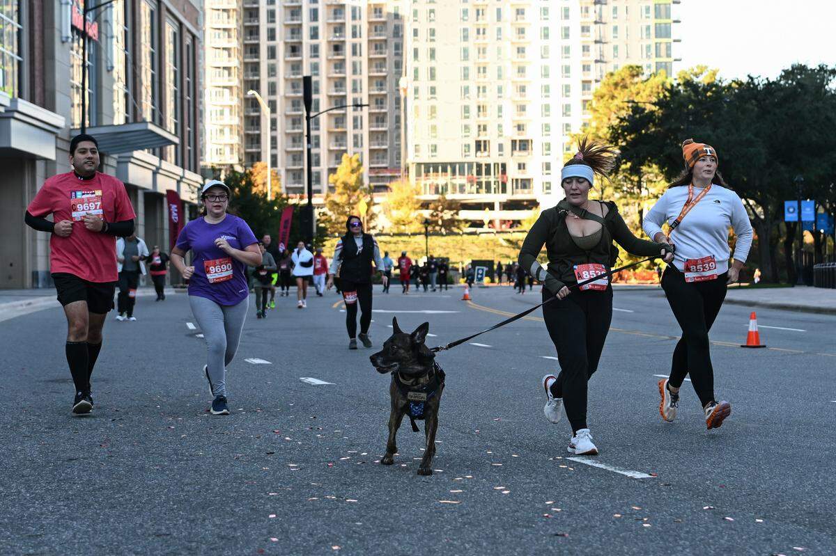 Participants take part in the 20th annual Novant Health Charlotte Marathon on Saturday, Nov. 16, 2024, in Charlotte