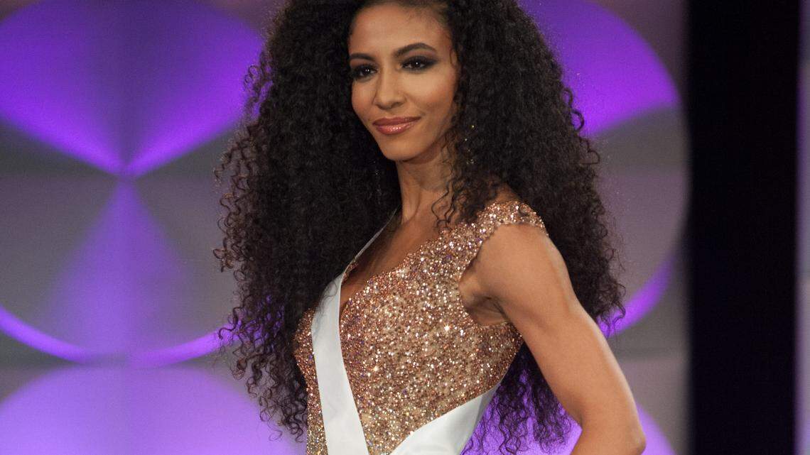 Miss USA, a Charlotte lawyer, falls short of the Miss Universe title but makes top 10