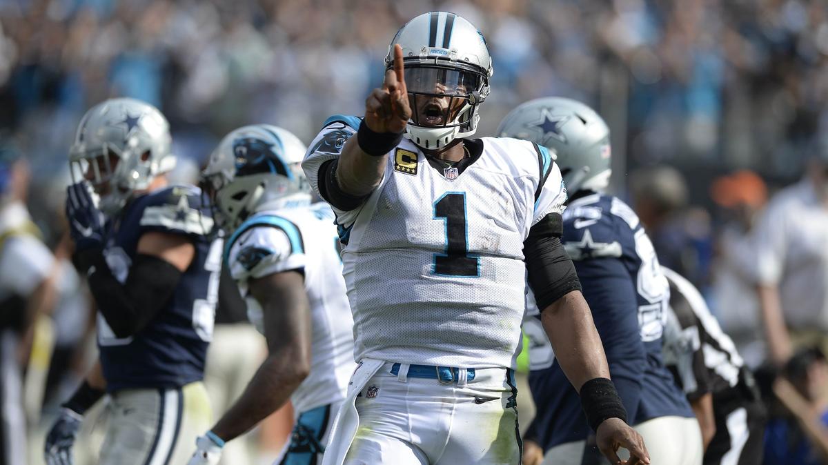 Carolina Panthers quarterback Cam Newton (1) points to the stands after a long first-quarter run against the Dallas Cowboys at Bank of America Stadium on Sunday. Newton ran for 59 yards in the first quarter (and minus-1 for the rest of the game) in a 16-8 victory in the season opener.