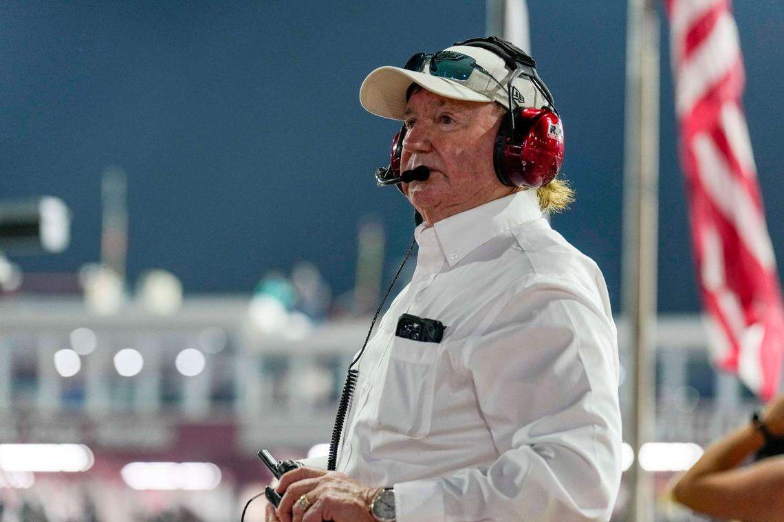NASCAR team owner Richard Childress watches the All Star Race at North Wilkesboro Speedway from atop Victory Lane.