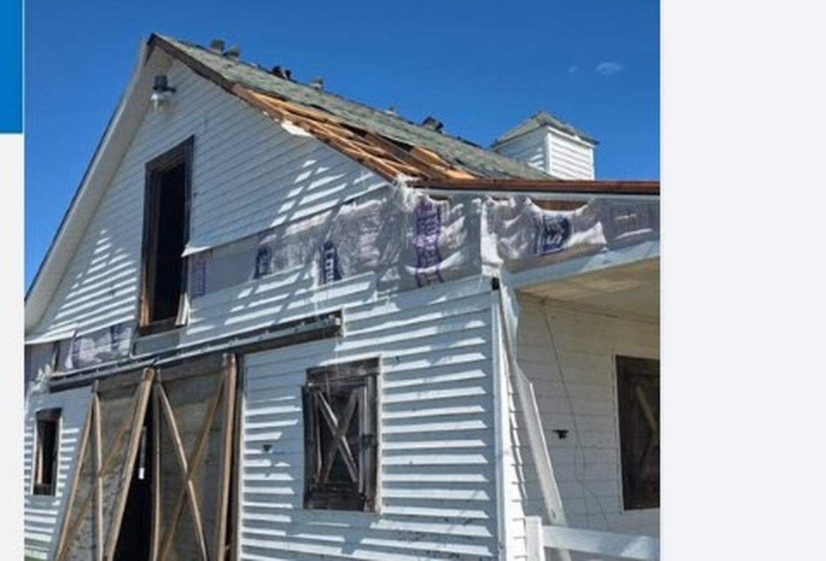 A 90-mph, EF-1 tornado that touched down near a farm on White Oak River Road in Maysville, Onslow County, on Thursday, March 12, damaged the roof, collapsed and removed barn doors and peeled siding off this farm building, a National Weather Service storm damage survey team reported.