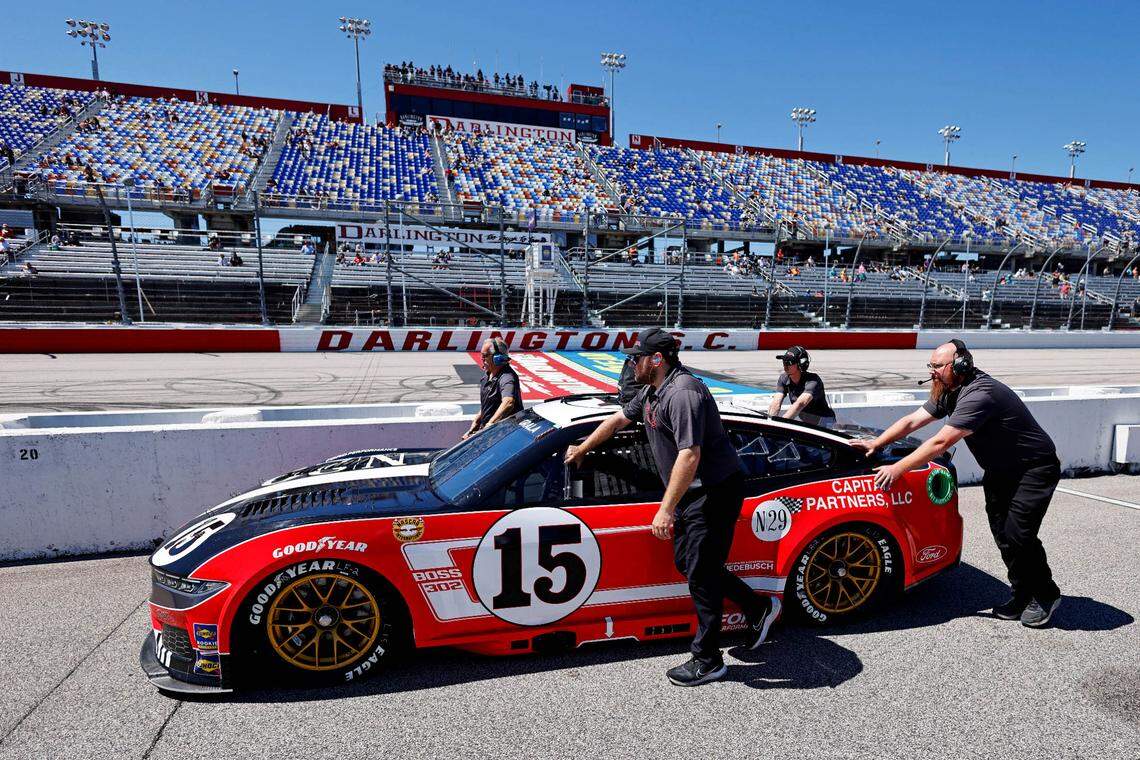 May 11, 2024; Darlington, South Carolina, USA; The car of NASCAR Cup Series driver Kaz Grala (15) is pushed during qualifying for the Goodyear 400 at Darlington Raceway.
