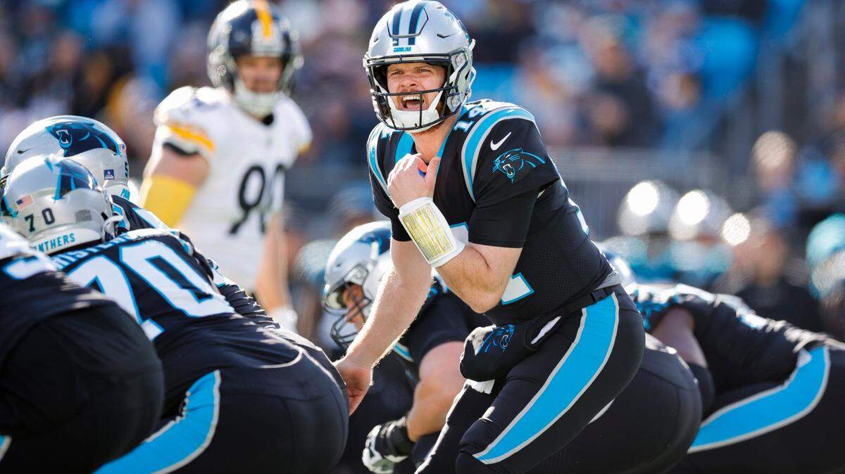 Carolina Panthers quarterback Sam Darnold (14) yells down the line during a game against the Pittsburgh Steelers at Bank of America Stadium in Charlotte, N.C., Sunday, Dec. 18, 2022.