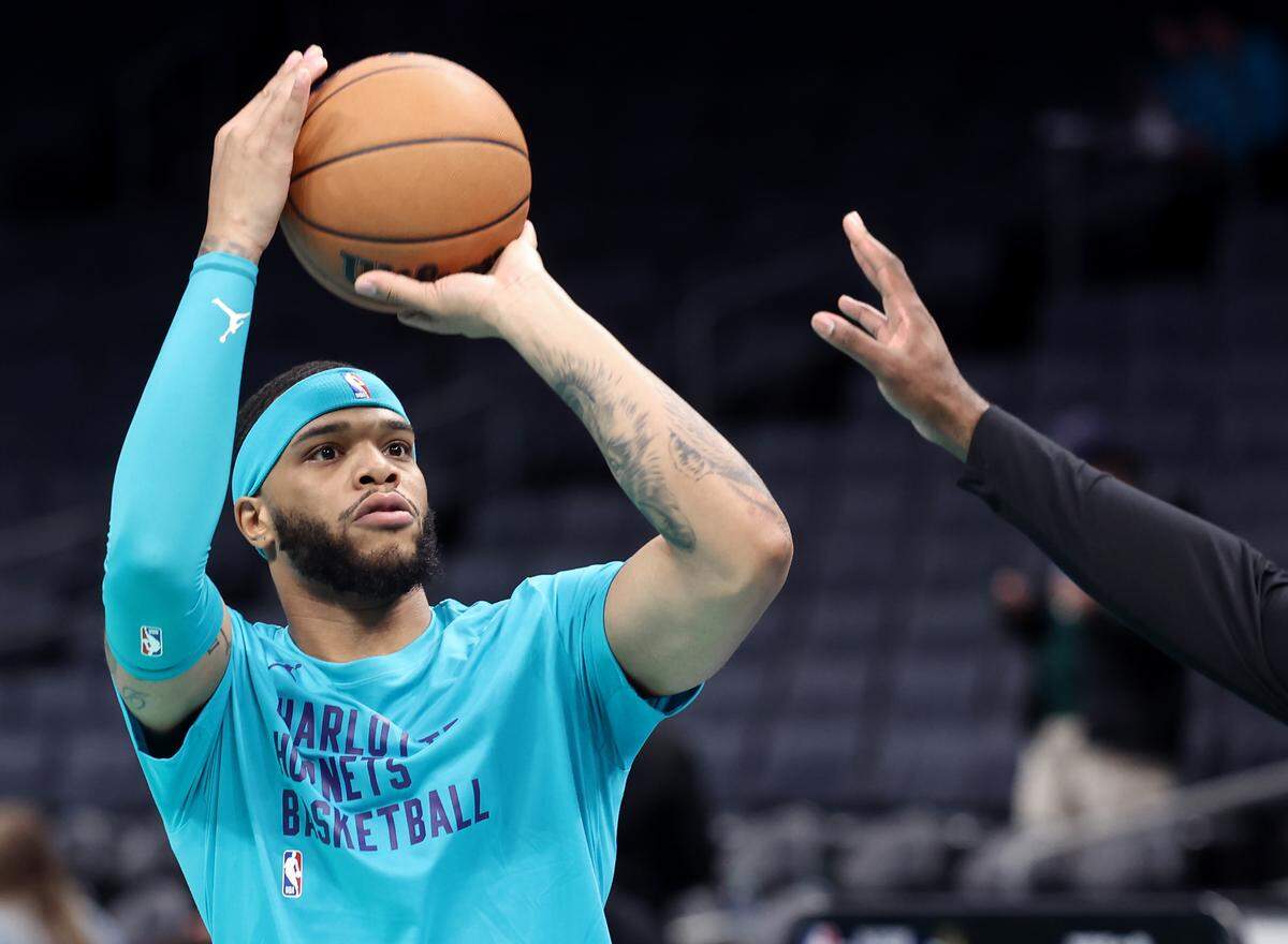 Charlotte Hornets forward Miles Bridges warms up before Friday night’s game against Milwaukee at Spectrum Center in Charlotte, N.C. It was Bridges’ first game for the Hornets in 583 days.