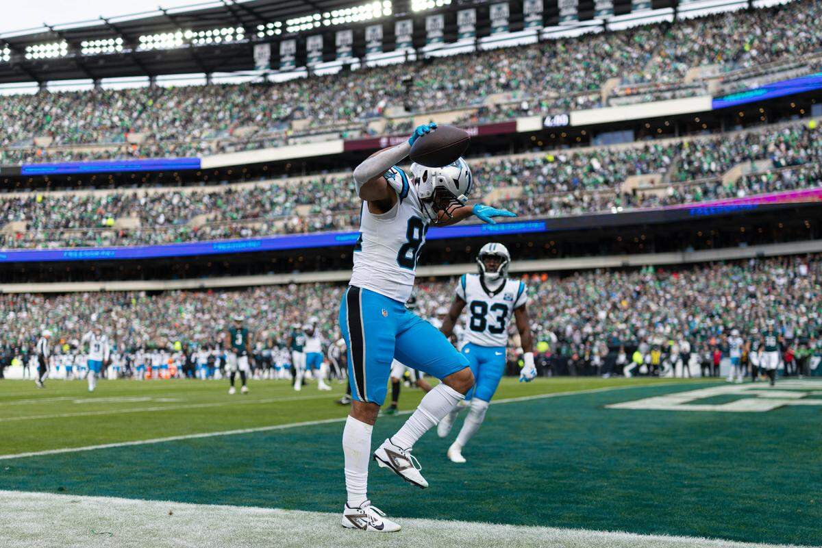 Dec 8, 2024; Philadelphia, Pennsylvania, USA; Carolina Panthers tight end Tommy Tremble (82) reacts after scoring a touchdown against the Philadelphia Eagles during the second quarter at Lincoln Financial Field. Mandatory Credit: Bill Streicher-Imagn Images